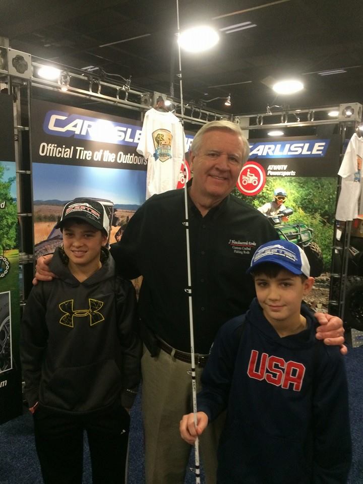 Jerry With Two Boys Holding Fishing Rods